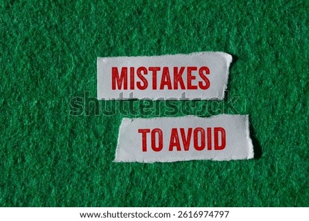Mistakes to avoid message written on ripped torn paper pieces on green background. Conceptual mistakes to avoid symbol. Copy space.