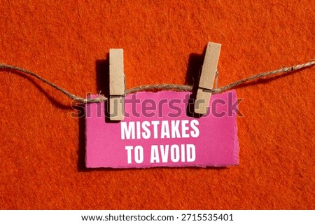 Mistakes to avoid message written on ripped torn paper background. Conceptual Mistakes to avoid symbol. Copy space.