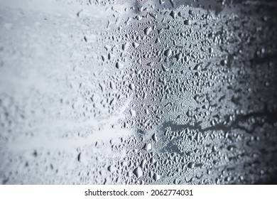 Misted glass. Rain outside the window. Water paths. For the background. - Shutterstock ID 2062774031