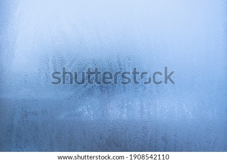 Misted window glass. Texture. Background.