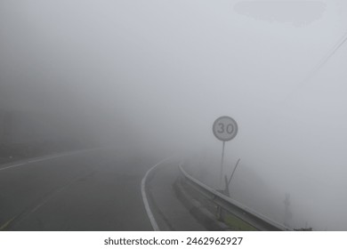 Misterious road fades on foggy environment - Powered by Shutterstock