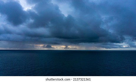 Mistic Wide View Over The Horizon Open Sea With Dramatic Cloudy Sky. 