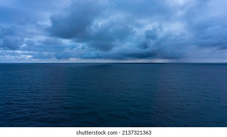 Mistic Wide View Over The Horizon Open Sea With Dramatic Cloudy Sky. 