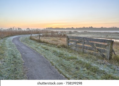 Misty agricultural polder landscape near Groningen, Netherlands