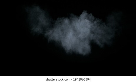 Misty chalk clouds blowing into the center. Isolated white smoke and fog wisp on black background. Studio concept and VFX plate shot for scene overlay cut out template and creative enhancement.