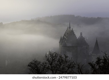 Misty day at ancient mountain castle - Powered by Shutterstock