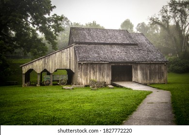 Misty Morning At A Barn In Rural Tennessee.  Historic barn on display at Norris Dam State Park in Tennessee. This is public property and not privately owned. 