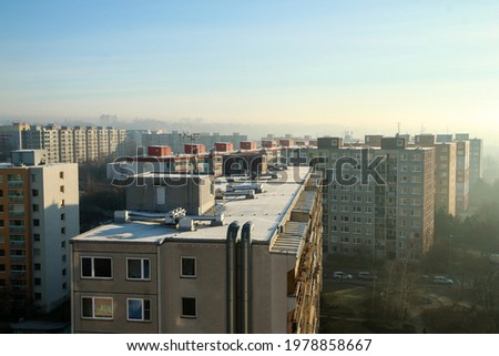 The misty morning detail of the part of the big area of high rise block of flats from the socialist era in Prague in Czech Republic called Černý most.