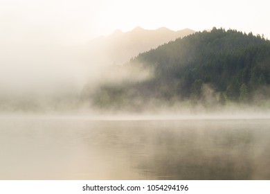 Misty morning at lkae Geroldsee in the Alps of Bavaria