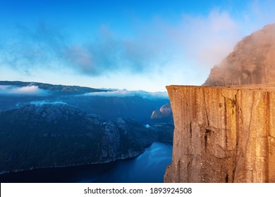 Misty morning on Preikestolen (pulpit-rock) - famous tourist attraction in the municipality of Forsand in Rogaland county, Norway. Landscape photography - Shutterstock ID 1893924508