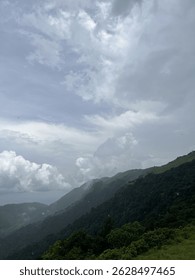 Misty Mountain Range Under a Dramatic Sky