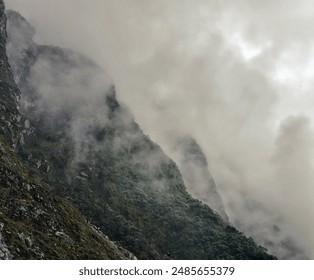 Misty rock mountains in the Papuan mountains - Powered by Shutterstock