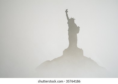 misty shadow of lady liberty statue on a hill