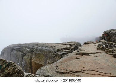 Misty View Of Preikestolen Rock In Norway