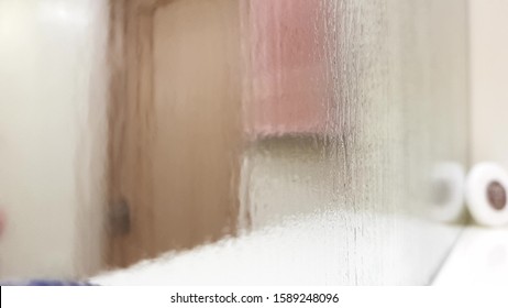 Misty Wet Mirror Over A Bathroom Shelf, Perspective View, Blurred Closeup