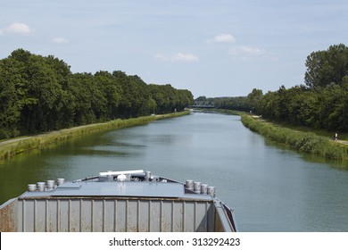 The Mittelland Canal at Bramsche (Germany, Lower Saxony) with the bow of an inland vessel.