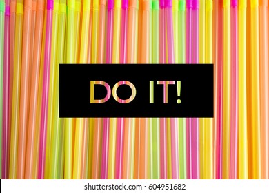 Mix Of Bright Colorful Straws. Vertical Stripes. Get Out Of Stress - Stay Positive. Closeup. Caption - Do It