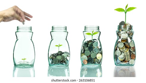 Mix coins and seed in clear bottle on white background,Business investment growth concept