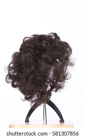 Mix Color Blonde Dark Brown Hair Wig On Head Holder Stand On Wood Table Floor White Background Studio Lighting