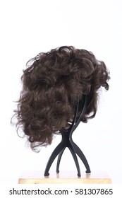 Mix Color Blonde Dark Brown Hair Wig On Head Holder Stand On Wood Table Floor White Background Studio Lighting