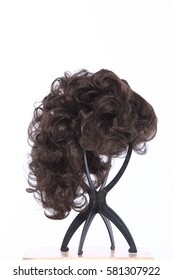 Mix Color Blonde Dark Brown Hair Wig On Head Holder Stand On Wood Table Floor White Background Studio Lighting