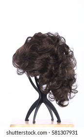 Mix Color Blonde Dark Brown Hair Wig On Head Holder Stand On Wood Table Floor White Background Studio Lighting