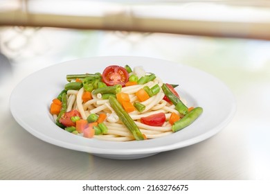 Mix Corn Pasta With Chees And Vegetable On Plate.