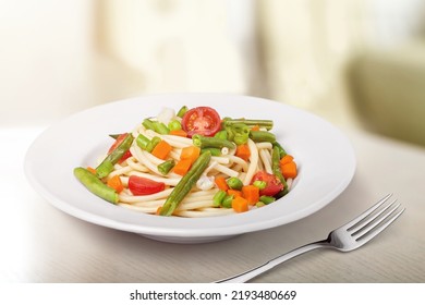 Mix Corn Pasta With Chees And Vegetable On Plate.