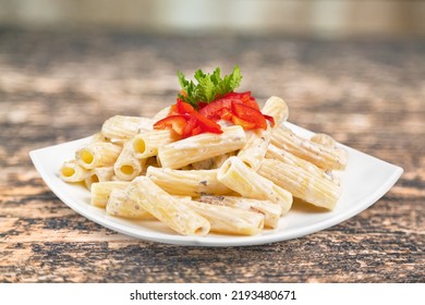 Mix Corn Pasta With Chees And Vegetable On Plate.