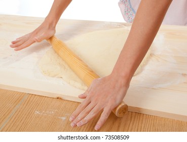 mix dough on the wooden board . Studio, white background. - Shutterstock ID 73508509