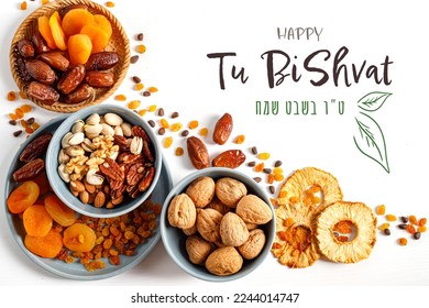 Mix of dry fruits and nuts   in a wicker plate, branch with young green leaves. Concept of the Jewish holiday. Banner with the inscription Tu Bishvat in English and Hebrew - Powered by Shutterstock