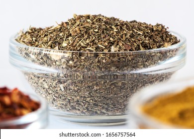 Mix of dry Italian Herbs in glass bowl. Blend of Italian Cuisine. Macrophotography - Powered by Shutterstock