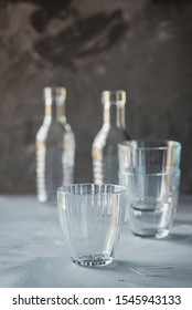 Mix of Empty table glasses on the marble gray table, selective focus