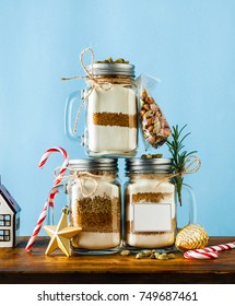 Mix Of Flour, Sugar, Nuts For Baking In A Jar . Christmas Mood Theme. Handmade Gift.