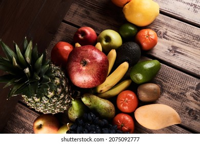 Mix Of Fresh Juicy Colorful Exotic Tropical Fruits On Wooden Background Top View