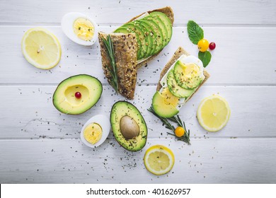 Mix of green vegetables and fruits on rustic background - Powered by Shutterstock