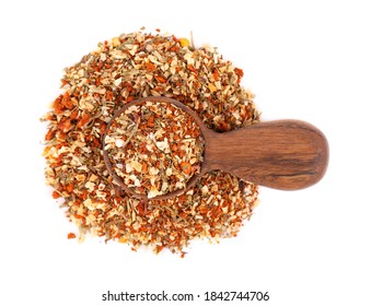 Mix of herbs, spices and dry tomatoes in wooden spoon, isolated on white background. Natural organic food seasoning. Top view. - Powered by Shutterstock