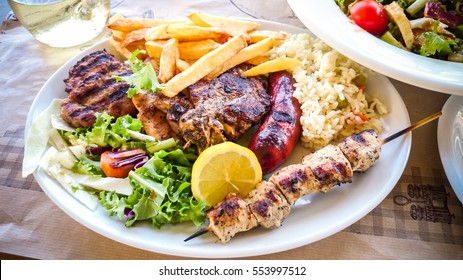 Mix Meat Plate With French Fries, Greek Food.