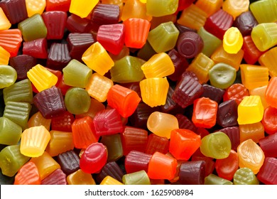 A mix of Midget Gems candy background, texture. sweet food