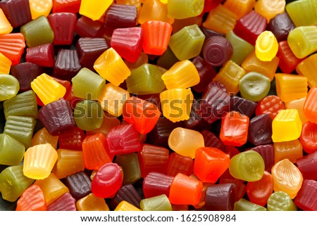 A mix of Midget Gems candy background, texture. sweet food