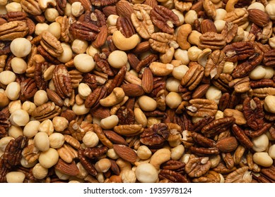 Mix of nuts as a background. Top view.  - Shutterstock ID 1935978124