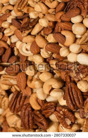 Mix of nuts as a background. Top view. 
