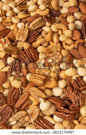 Mix of nuts as a background. Top view. 