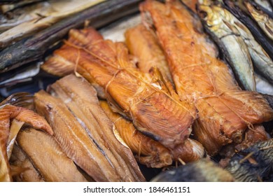 Mix of smoked fish, on store shelves.