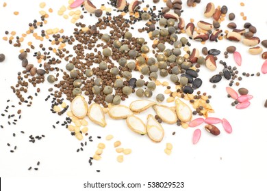 Mix Of Vegetable Seeds On White Background.