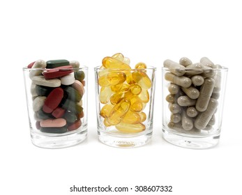 Mix Vitamin In Glasses,Fish Oil,vitamin,supplements,thai Pepper,zinc,capsule Isolated On White Background,dietary Supplement Product,tablets