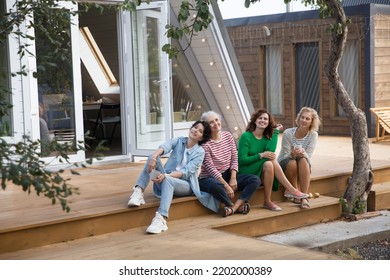 Mixed Age Group Women Friends Having Fun Together  Outdoor. Healthy Lifestyle. Diverse Friendship. Elderly Woman Along With Adult Daughters Near Her Home