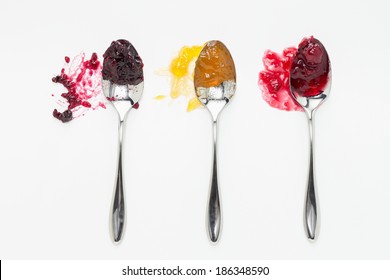 Mixed Berry, Apricot And Sour Cherry Jam On Spoons