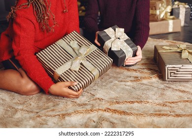 Mixed Couple Having Fun And Spending Christmas Together