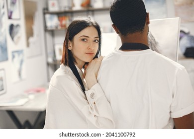 Mixed Couple Painting Picture In Workshop